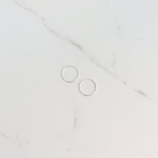Load image into Gallery viewer, Small Silver Sleeper Hoop Earrings - Gemlet
